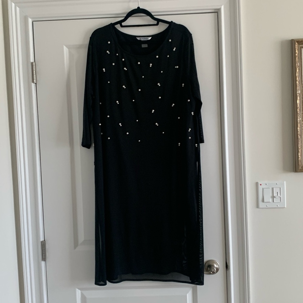 Woman’s formal long, bottom half see-through dress.